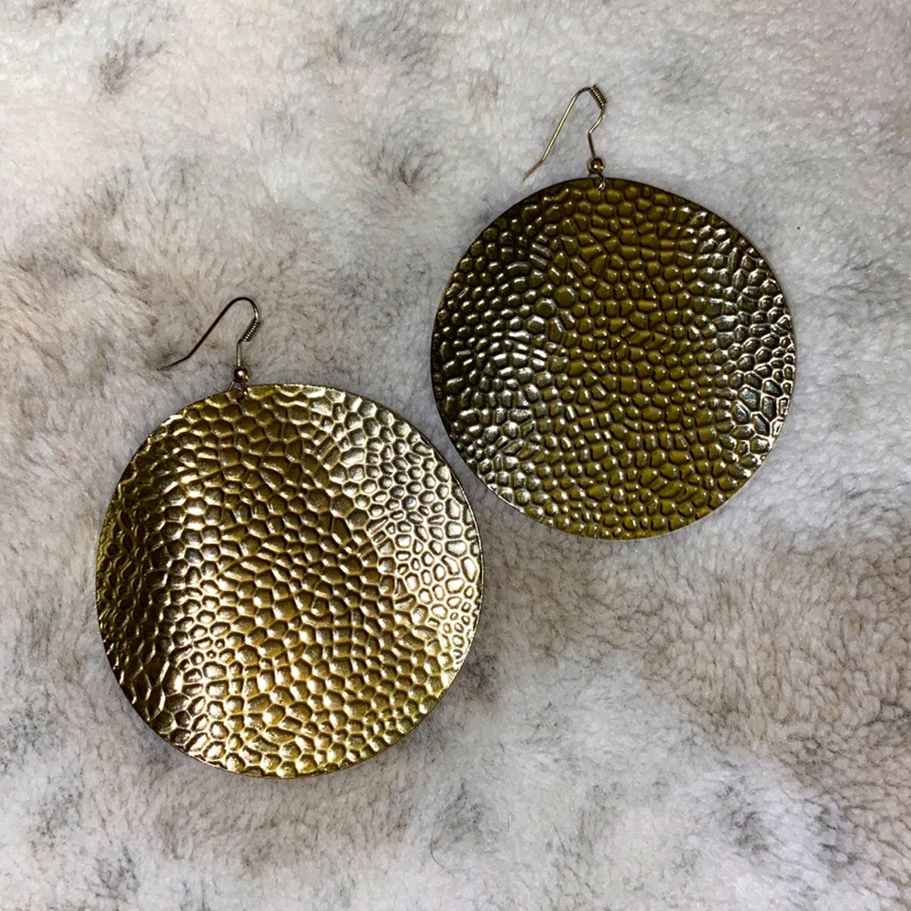 Gold colored earrings
